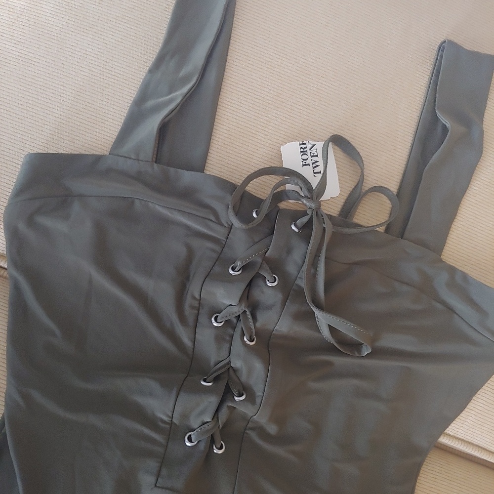 New with tags olive green body suit